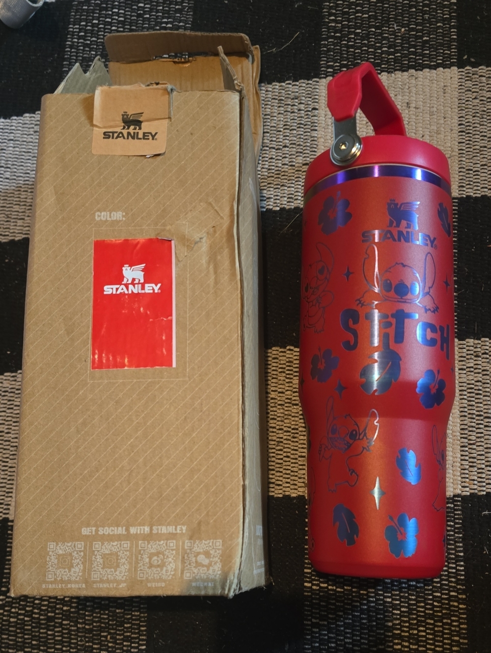 Stanley Red Travel Tumbler with Metallic Blue Accents